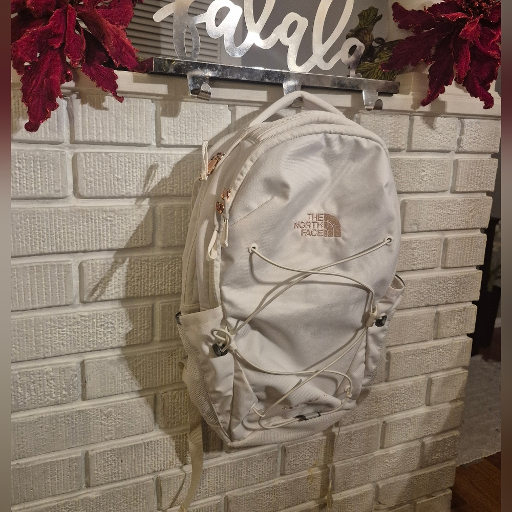 The North Face Lux Off-White Backpack With Rose Gold Accents